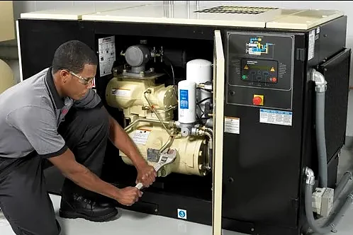 AirMech technician servicing an air compressor